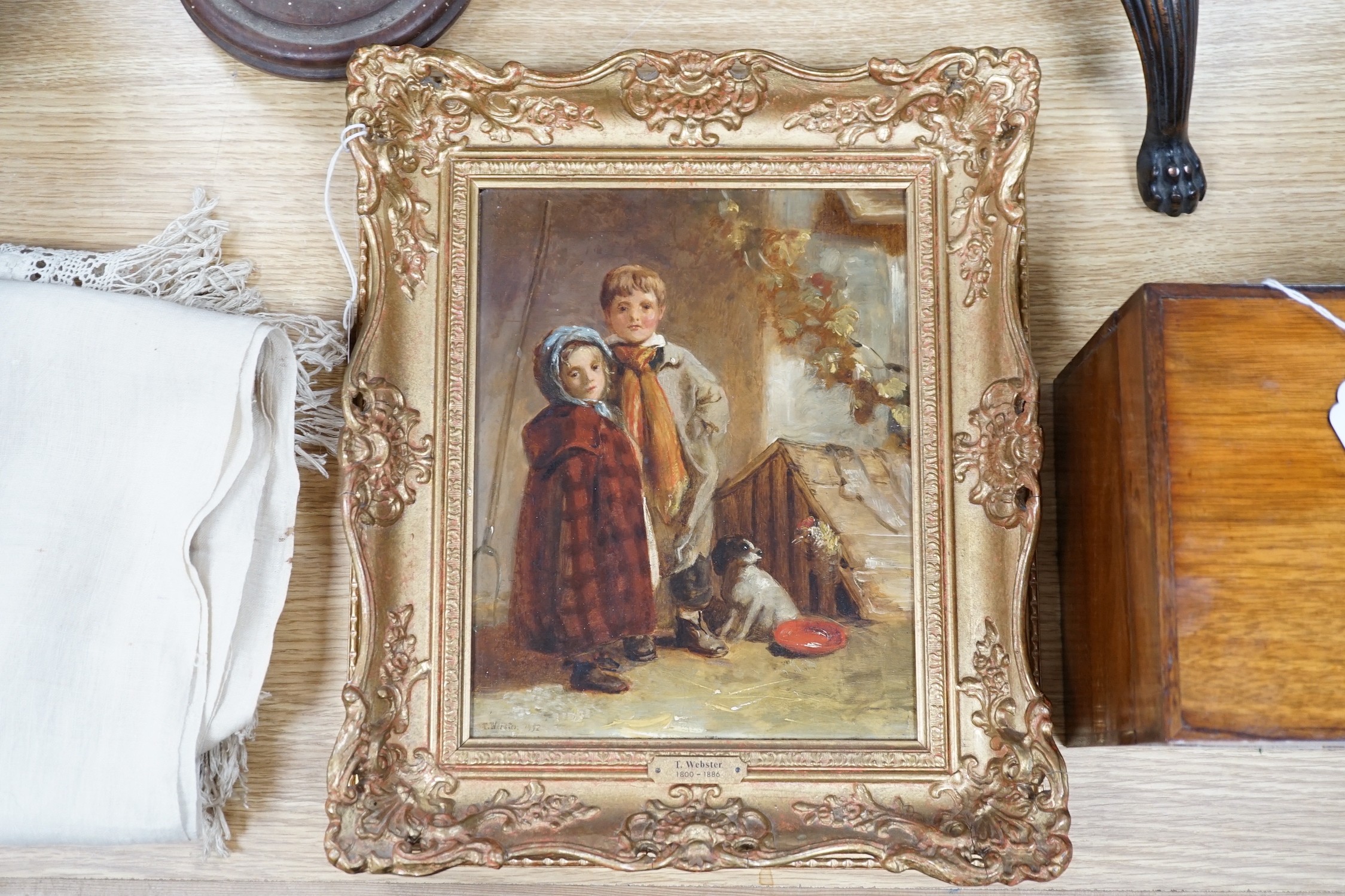 Thomas Webster (1800-1886), oil on wooden panel, Children standing beside a kennel, signed and dated 1852, Cider House Galleries label verso, 25 x 19cm